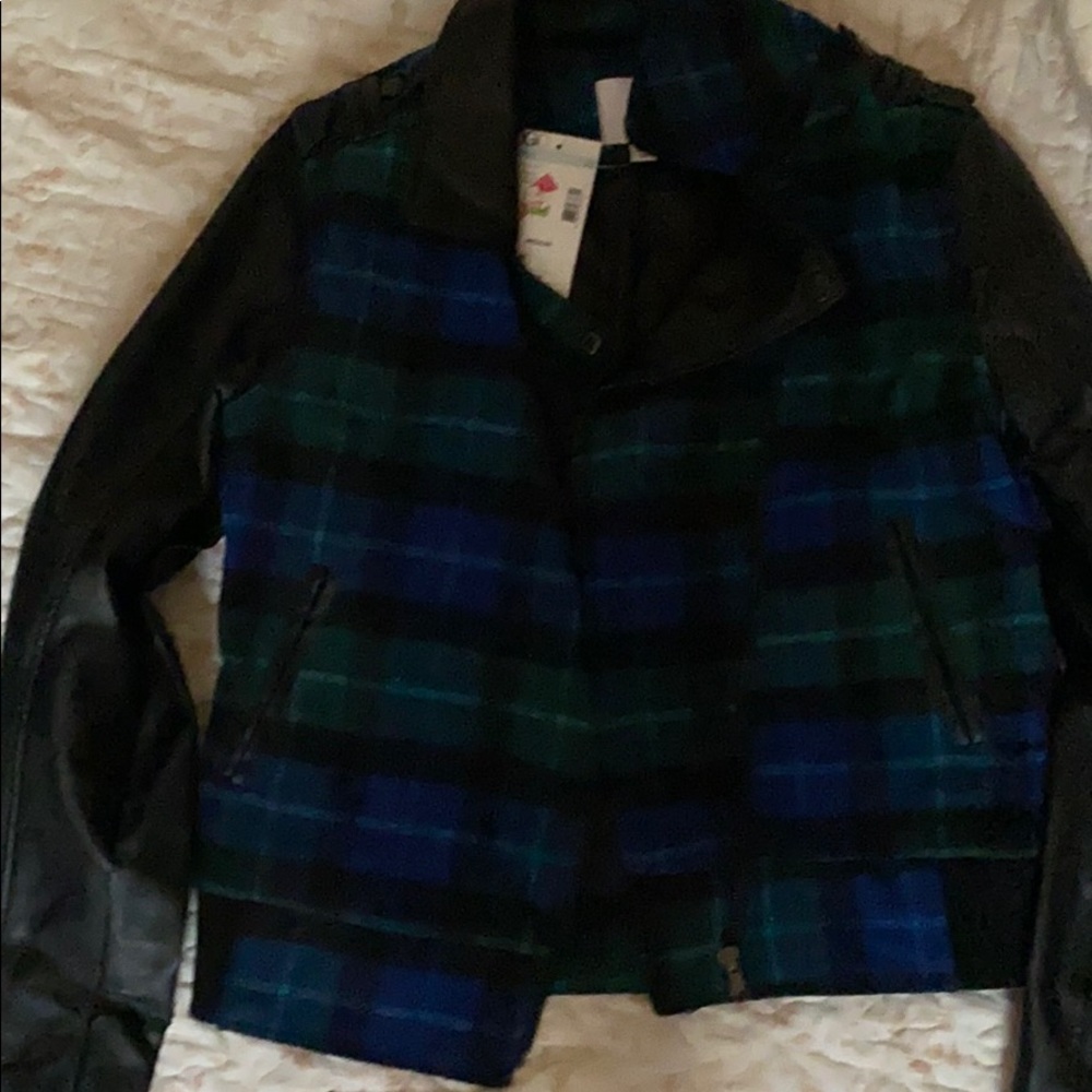 A leather jacket with plaid prints
